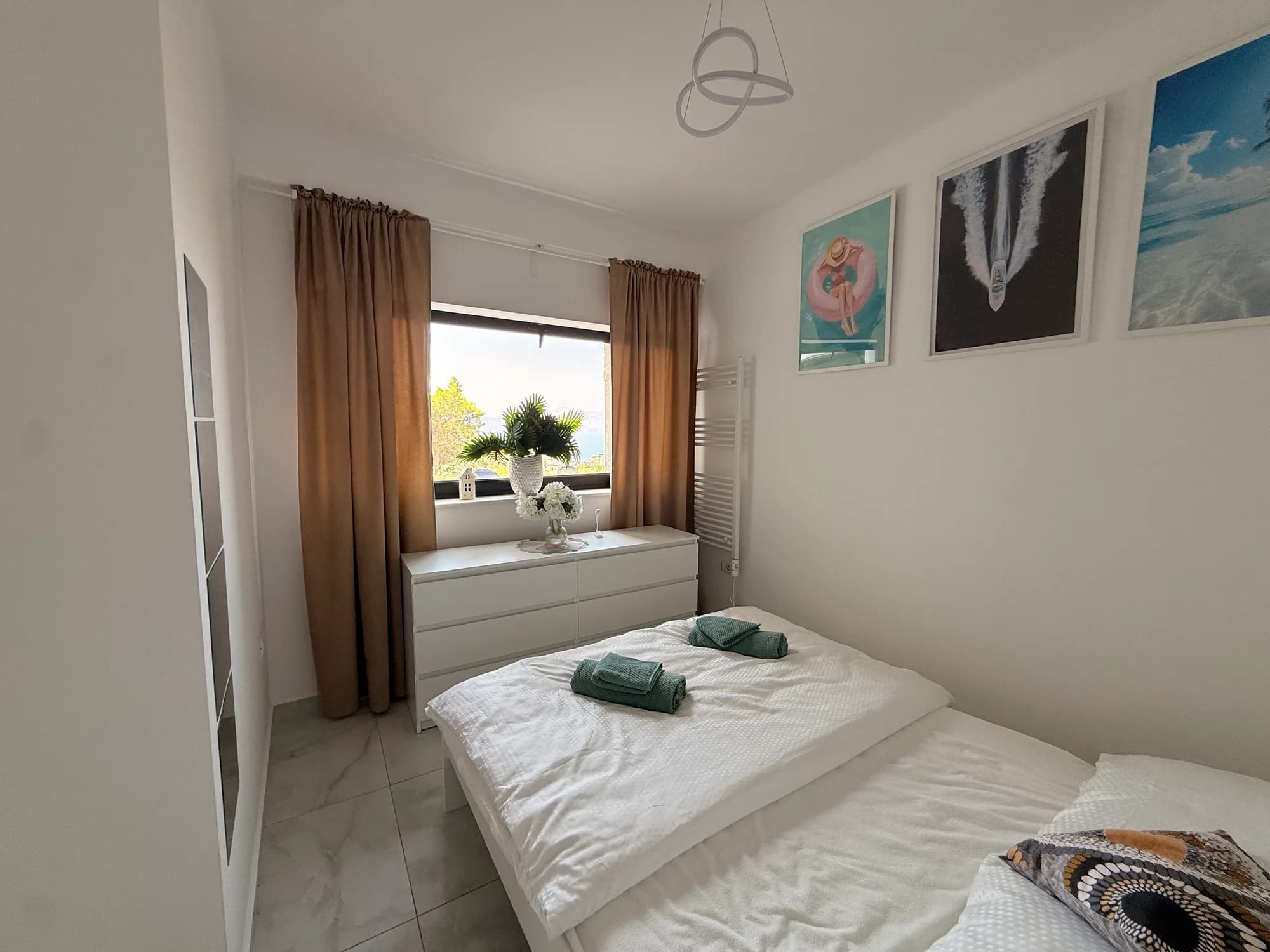 Royal — bedroom with a sea-view window